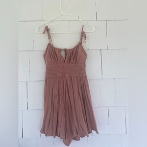 Pink romper with tie front
